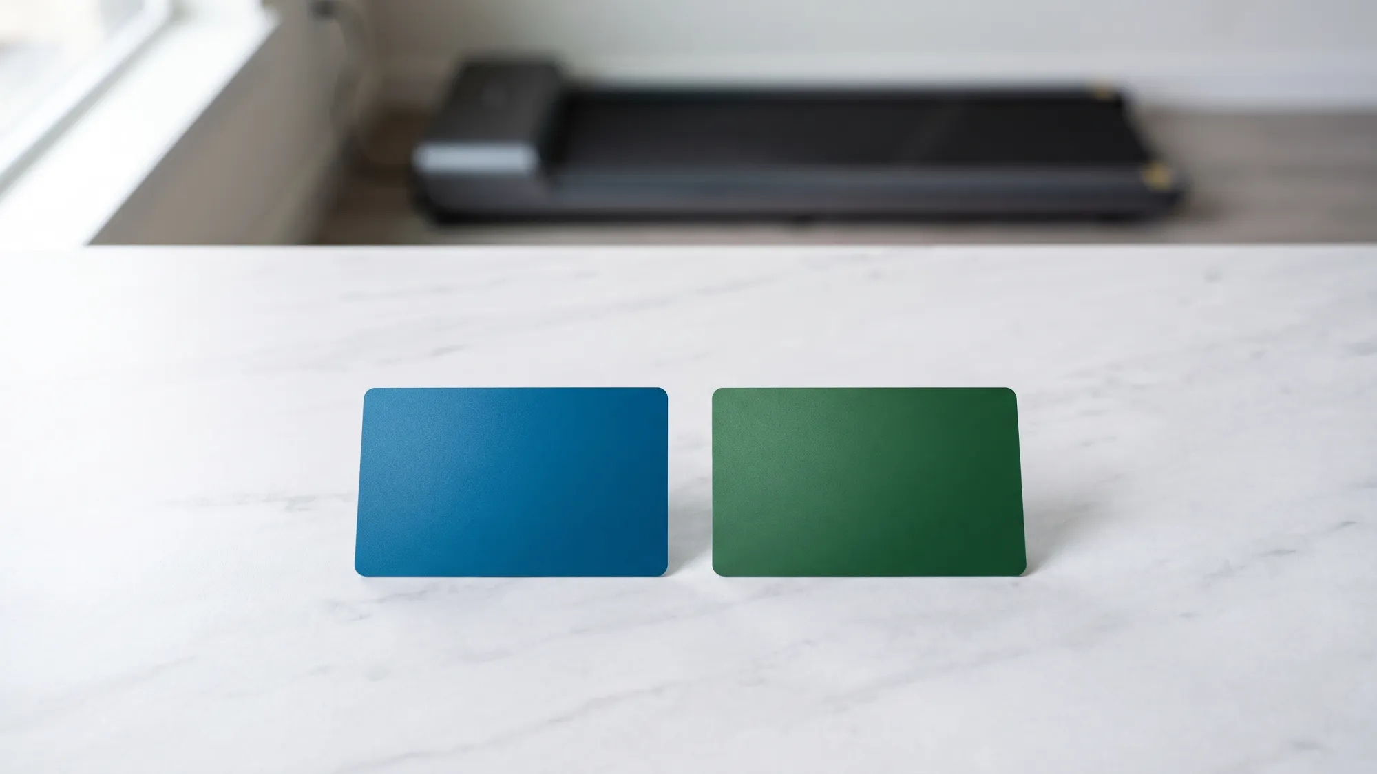 Two payment cards representing FSA and HSA with a walking pad nearby.